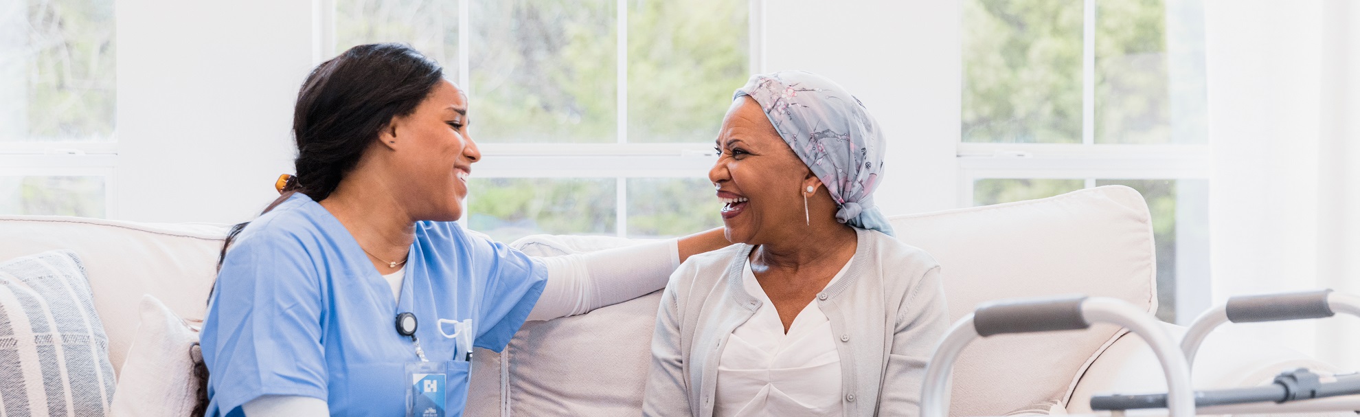 Smiling caregiver and patient.